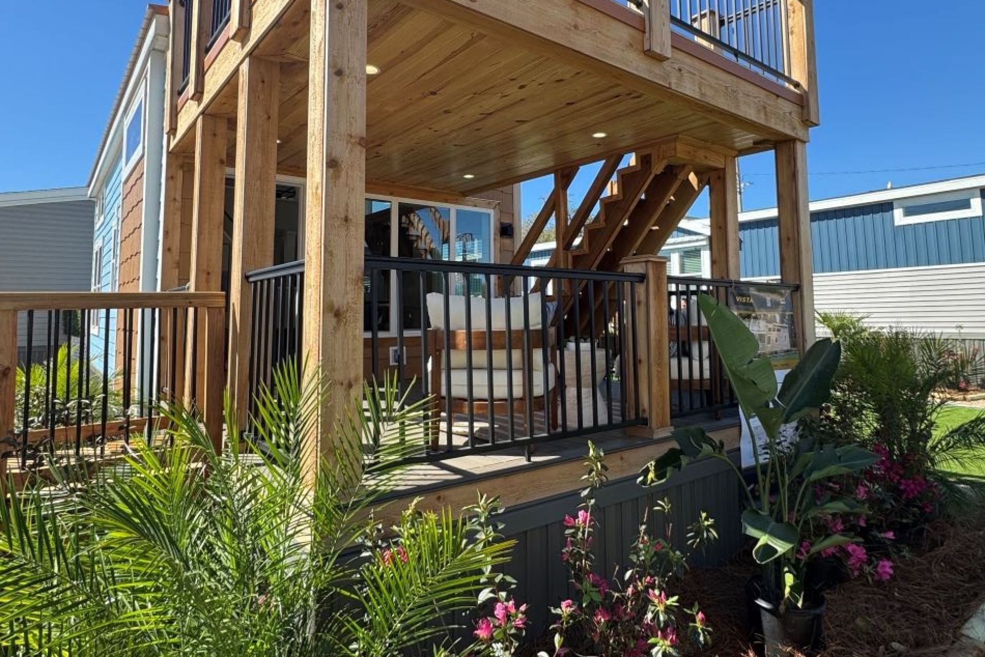 A stylish wooden cabin amidst lush greenery, ideal for a nature escape.