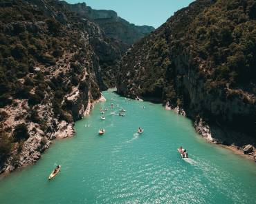 Boating in the bay between the slopes